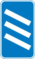 A blue upright sign with three white diagonal bars
