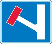 A blue rectangle with a white upright bar topped by a short red bar